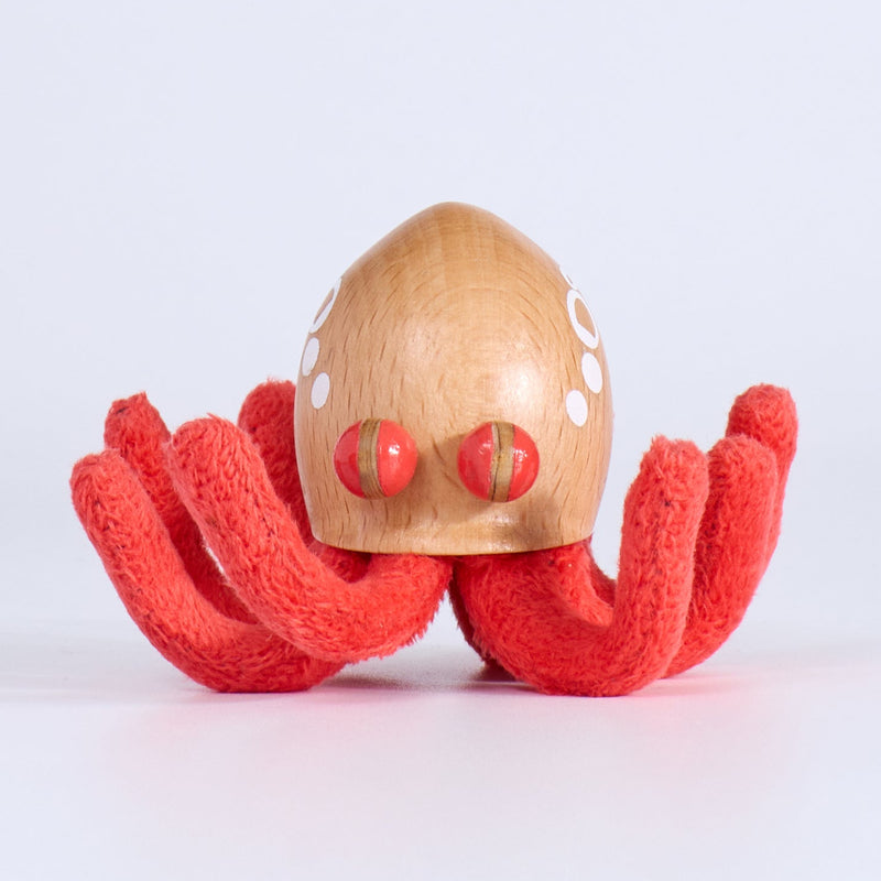 Wooden octopus on a white background